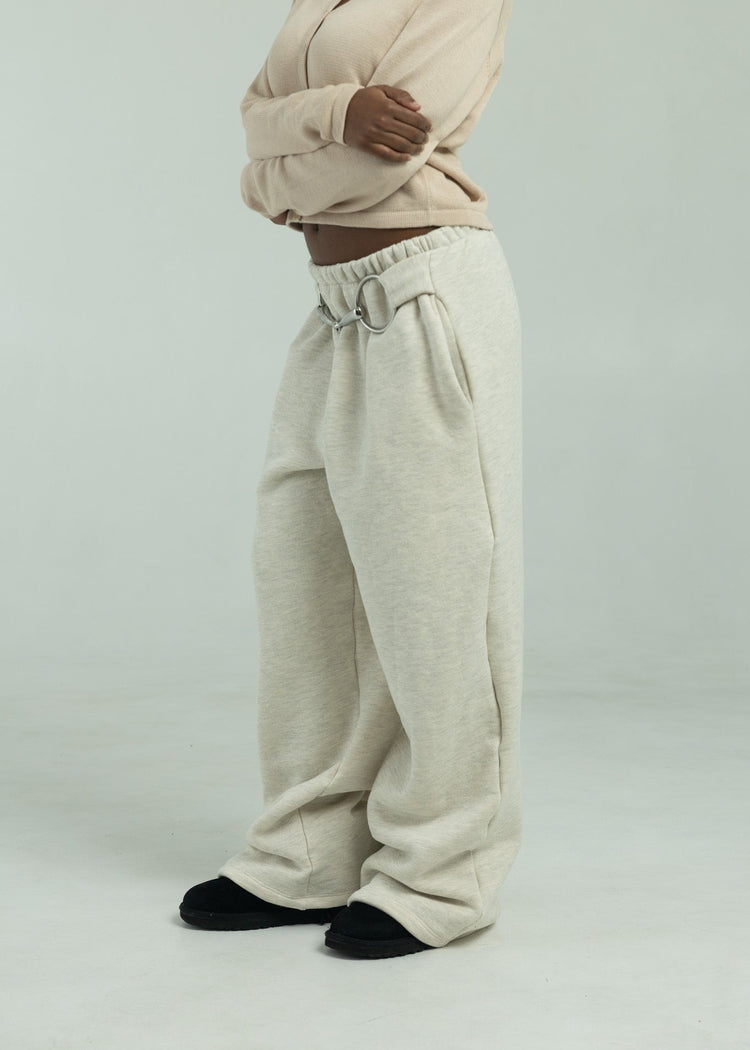 Model wearing pebble pants from the side