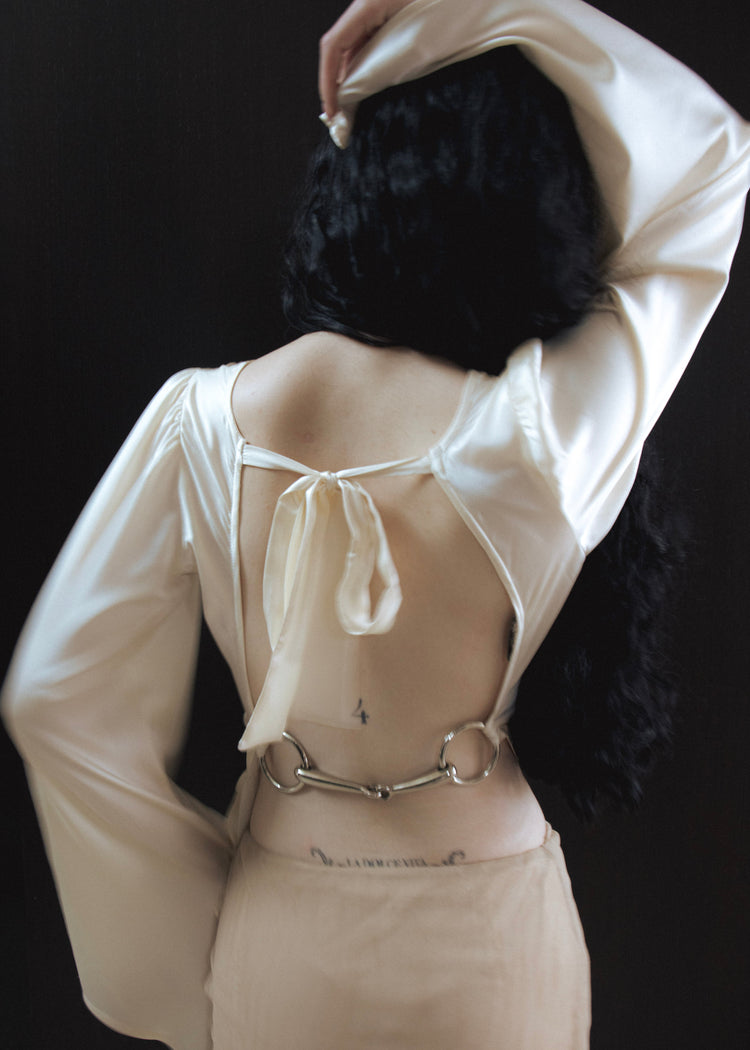 Model in cloud top, main photo