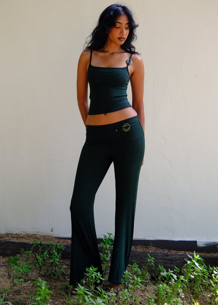 Model wearing scarab tank