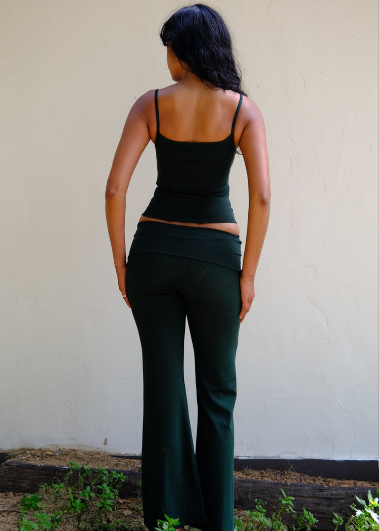 Model wearing scarab tank