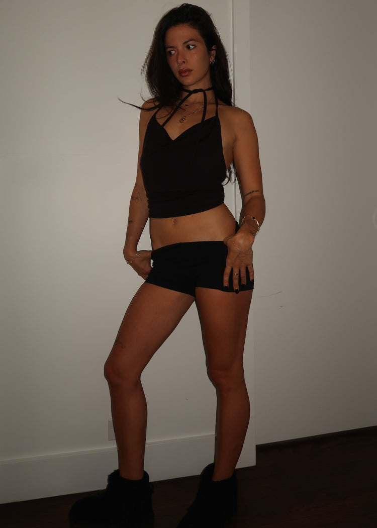 Model wearing Bit Top in black from the front