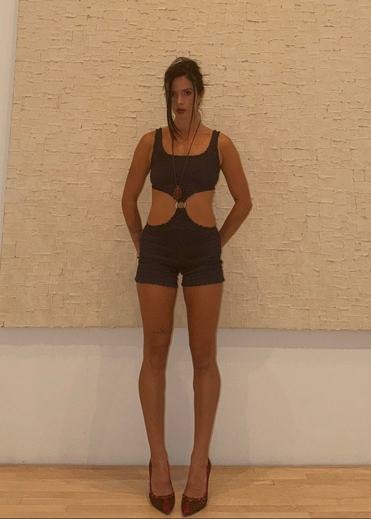 model wearing onyx romper 