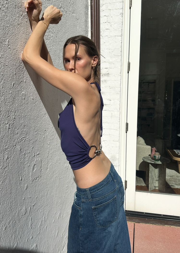 Model in Bit Top in astral aura from the side