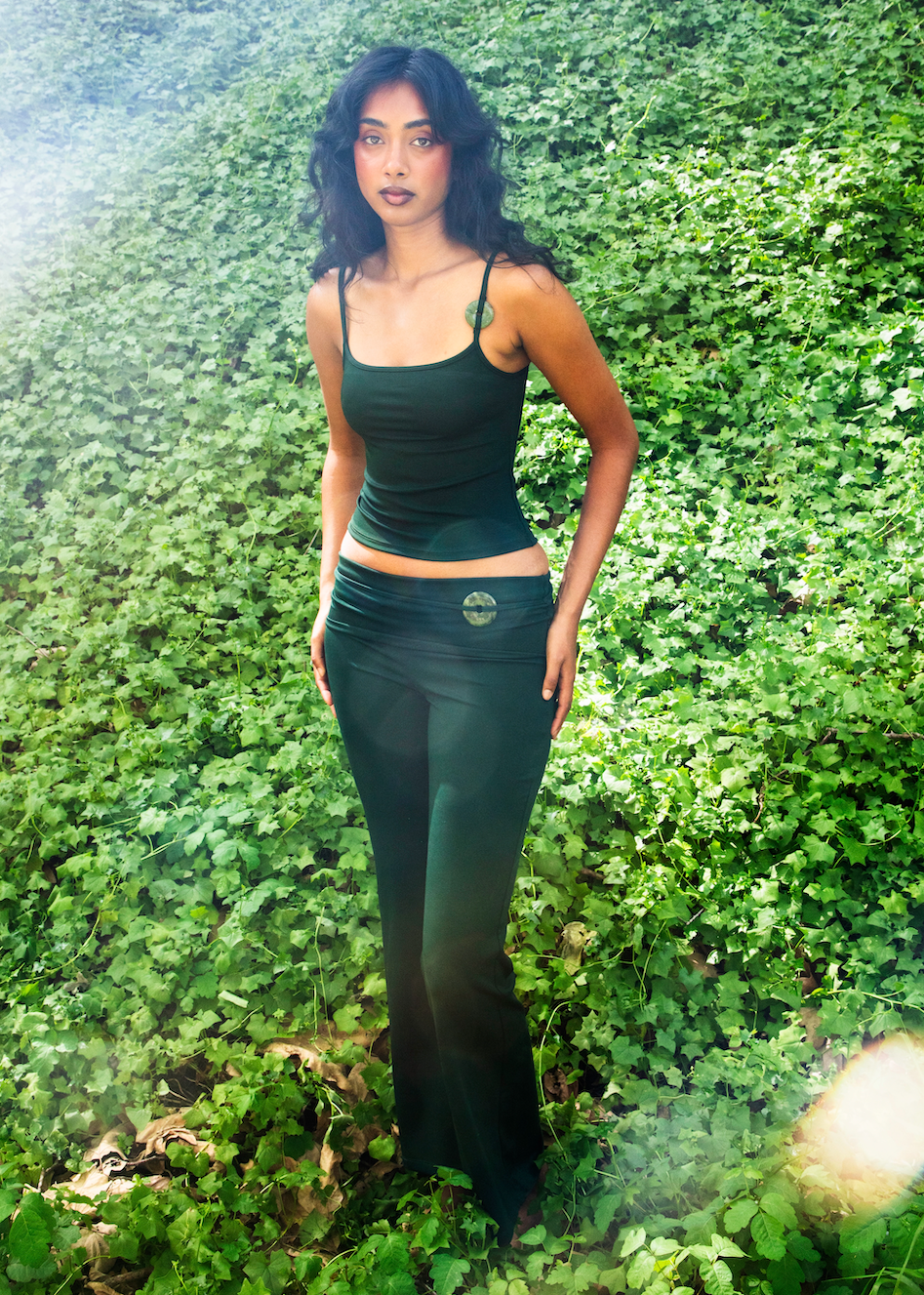 Model wearing scarab pants, main photo