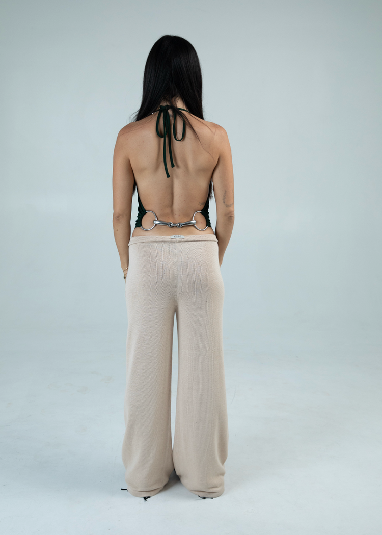 Model in Bit Top in scarab from the back
