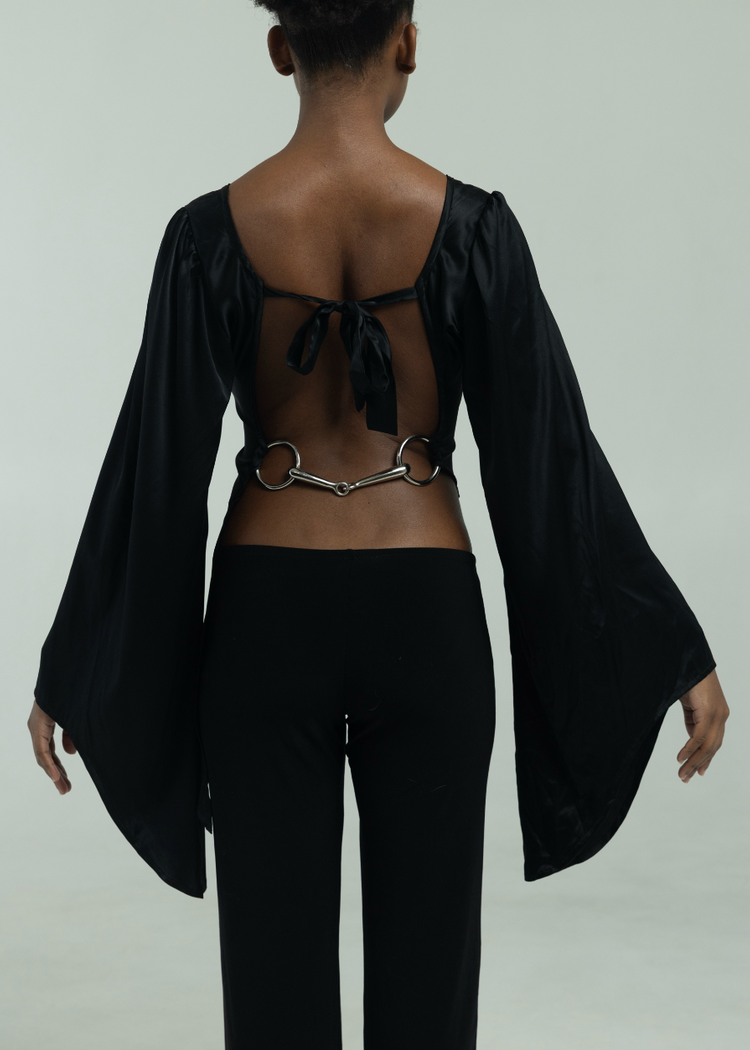Model in black top