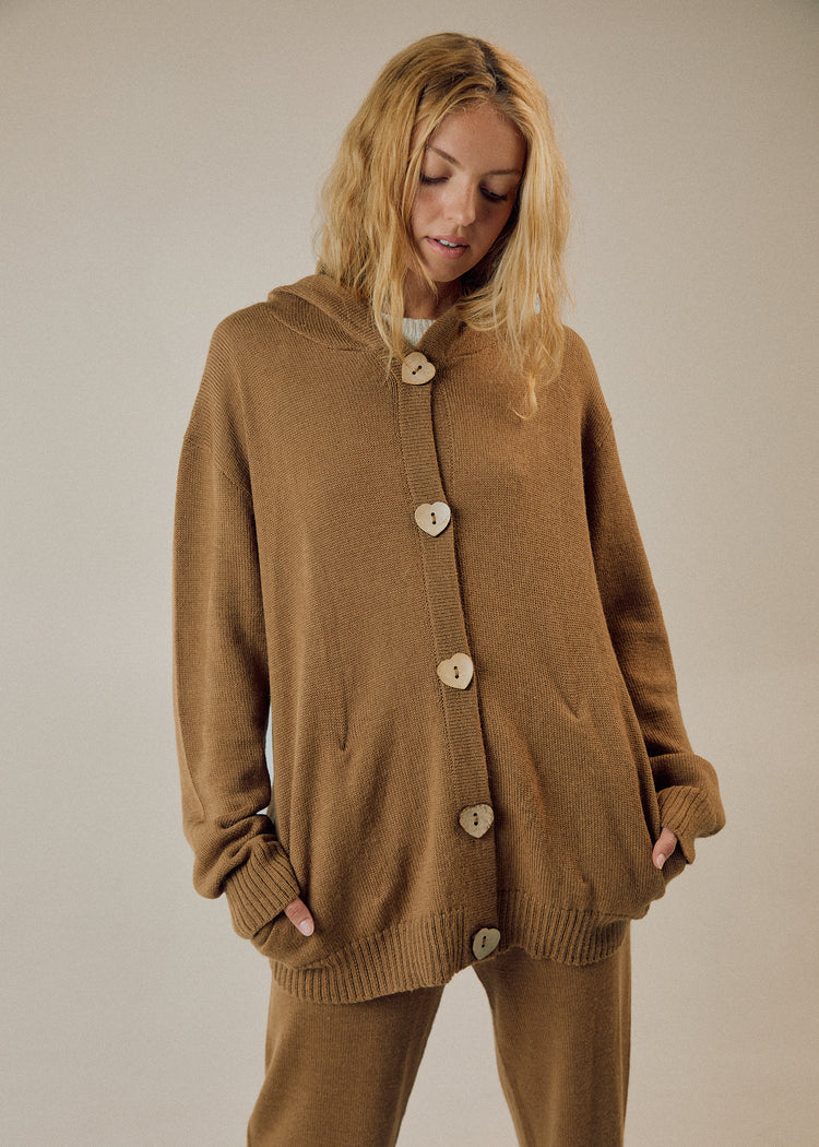 Model in camel cardigan, main photo