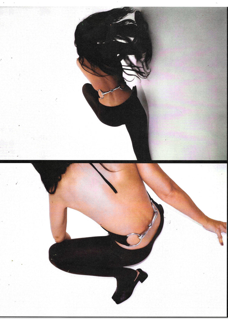 Model wearing Bit Top in black from the back